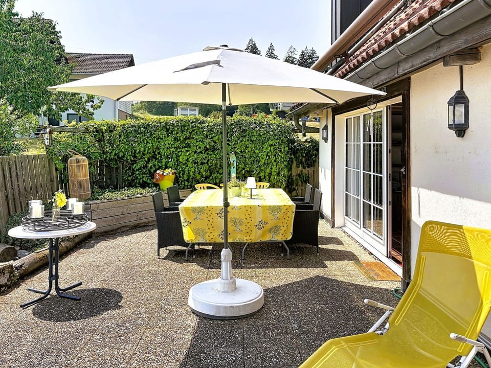 Furniture, Chair, Umbrella, Outdoor Furniture, Table, Outdoor Table, Garden, Shade, Patio