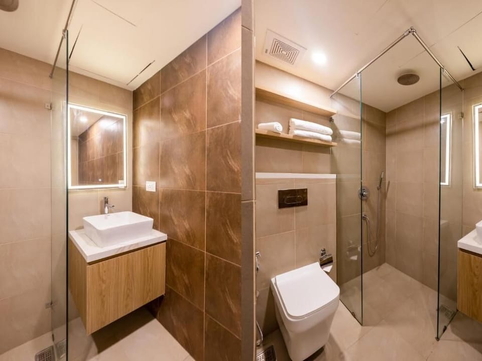 Shower, free toiletries, hair dryer, slippers