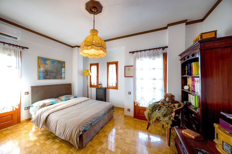 Deluxe Room, Partial Sea View | Premium bedding, minibar, individually decorated, individually furnished