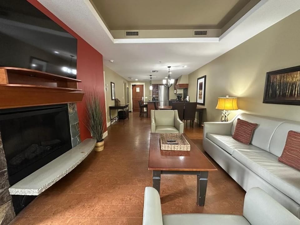 Family Condo, Balcony, Courtyard View | Living area | Smart TV, fireplace