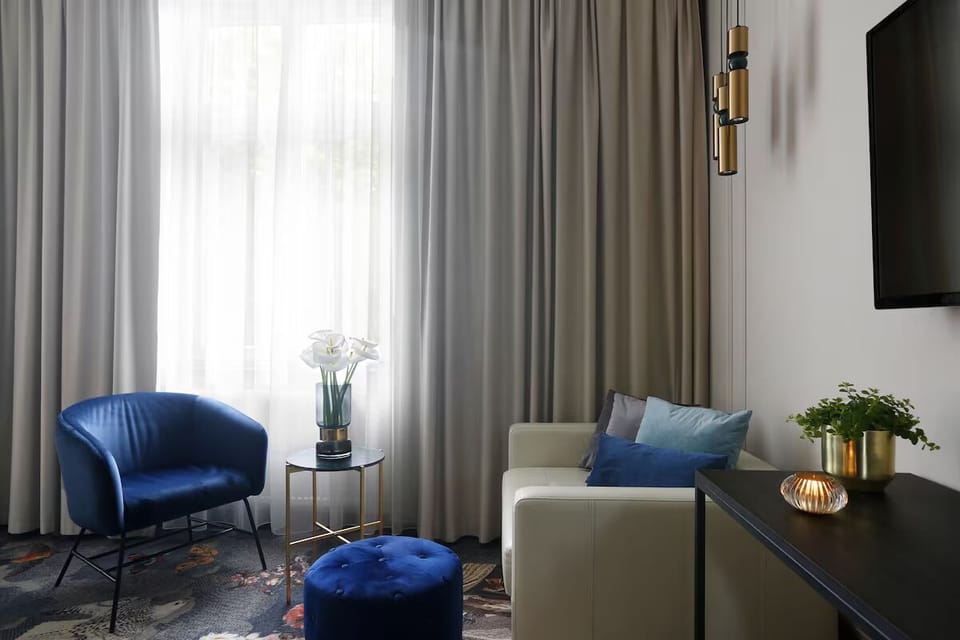 Relax by the bright window with a book and coffee.