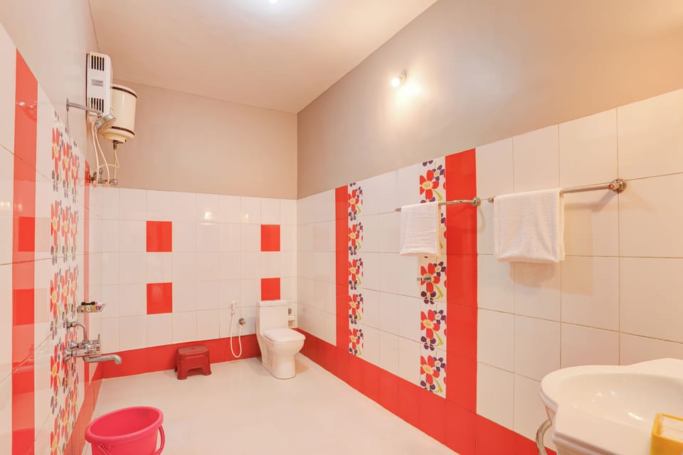 Shower, free toiletries, slippers, towels