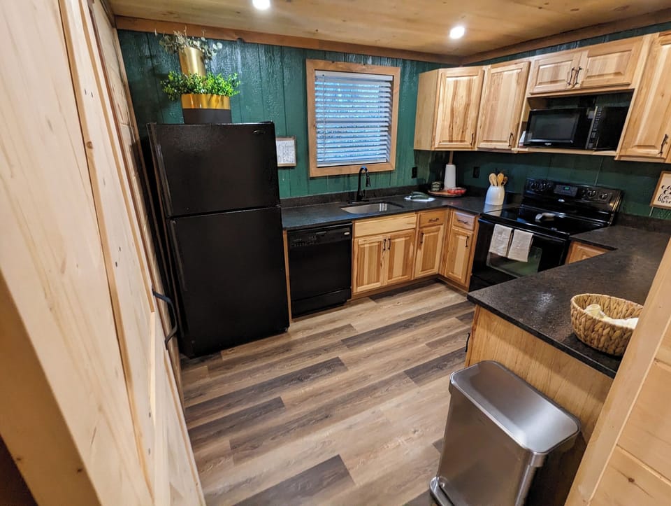 Full kitchen with cooking essentials provided