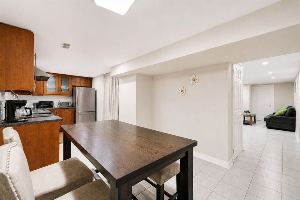 Spacious eat-in kitchen with large dining table and open-concept layout
