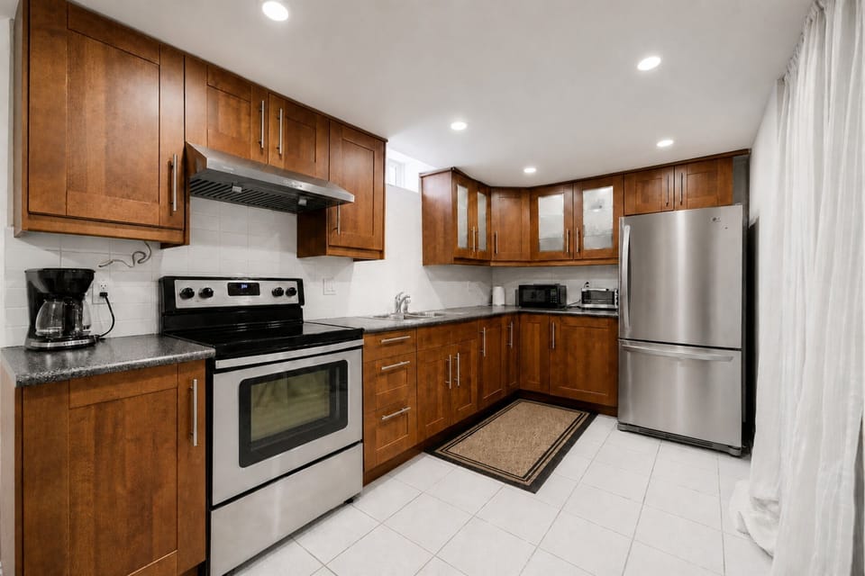 Bright modern kitchen with stainless appliances and ample counter space