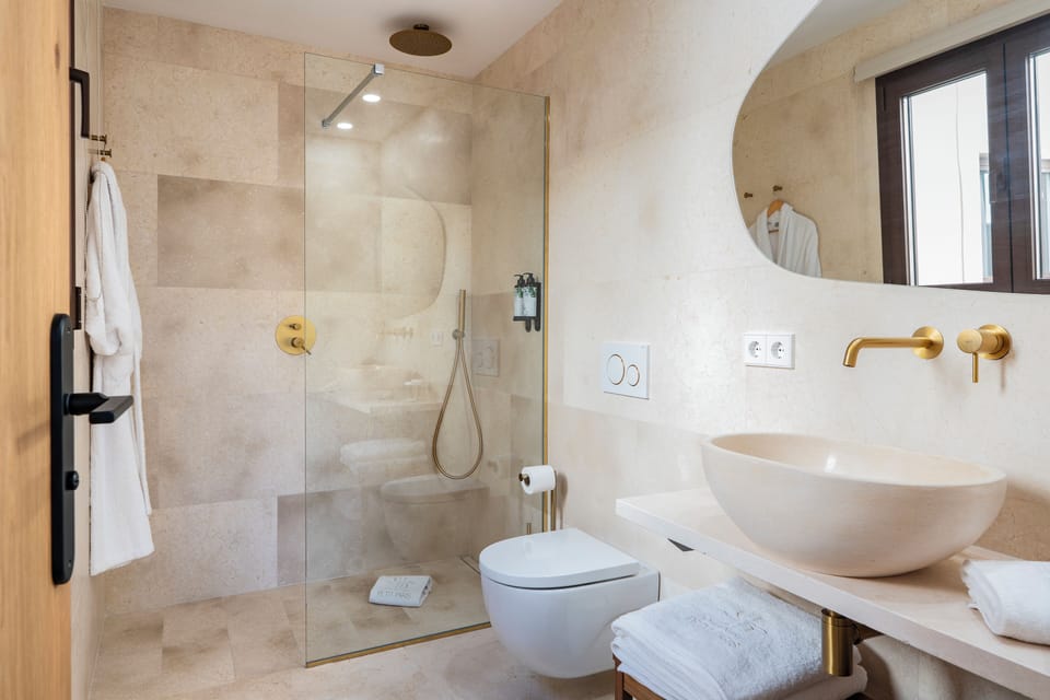 Double Room, Pool View | Bathroom | Shower, free toiletries, hair dryer, bathrobes