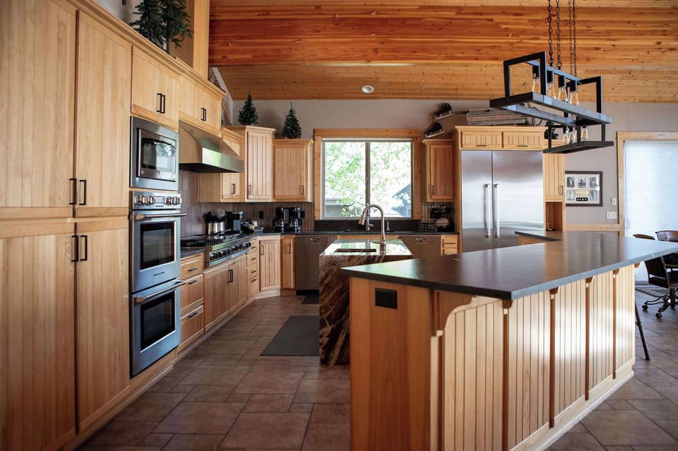 Kitchen with double oven and Viking Gas Range