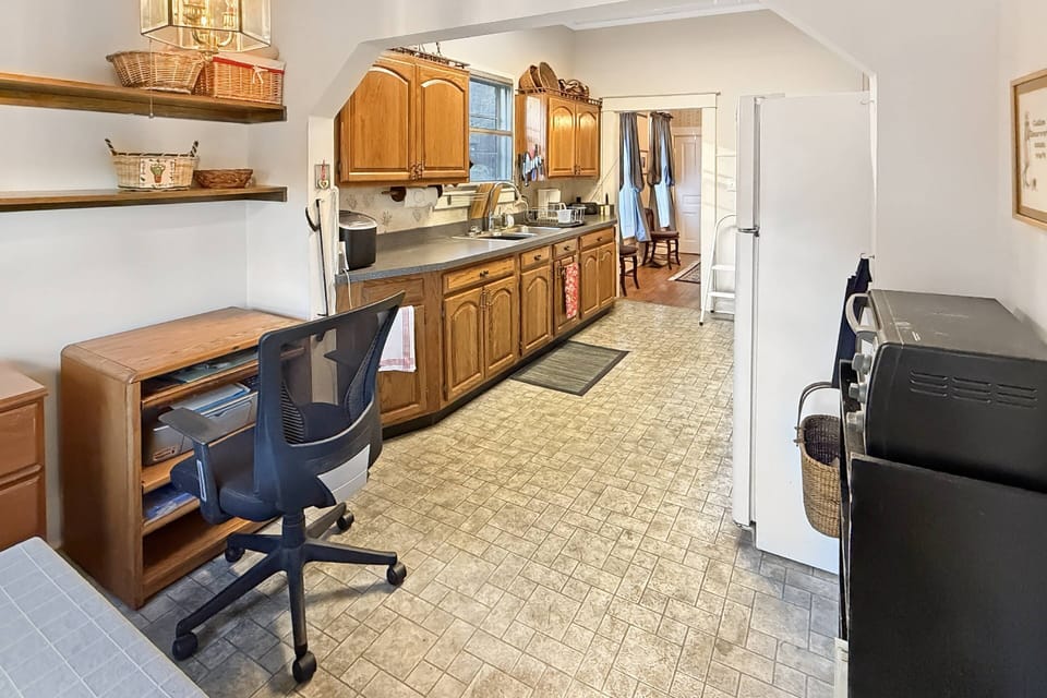 Fully stocked kitchen with table for eat-in kitchen
