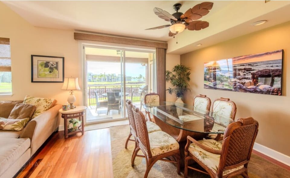 Gather for sunset dinners beside bright sliding doors and lanai.