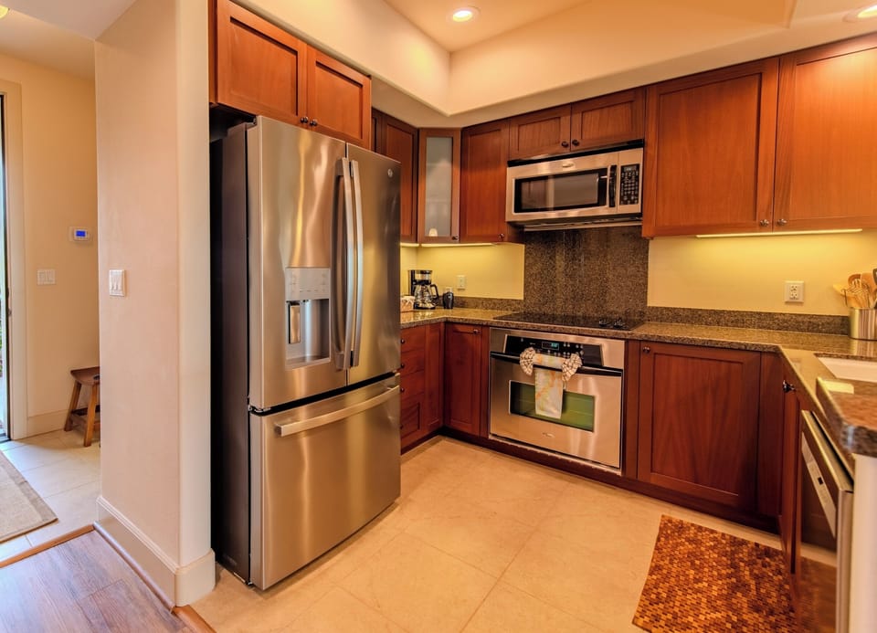 Cook with ease in a fully equipped, stainless-steel kitchen.