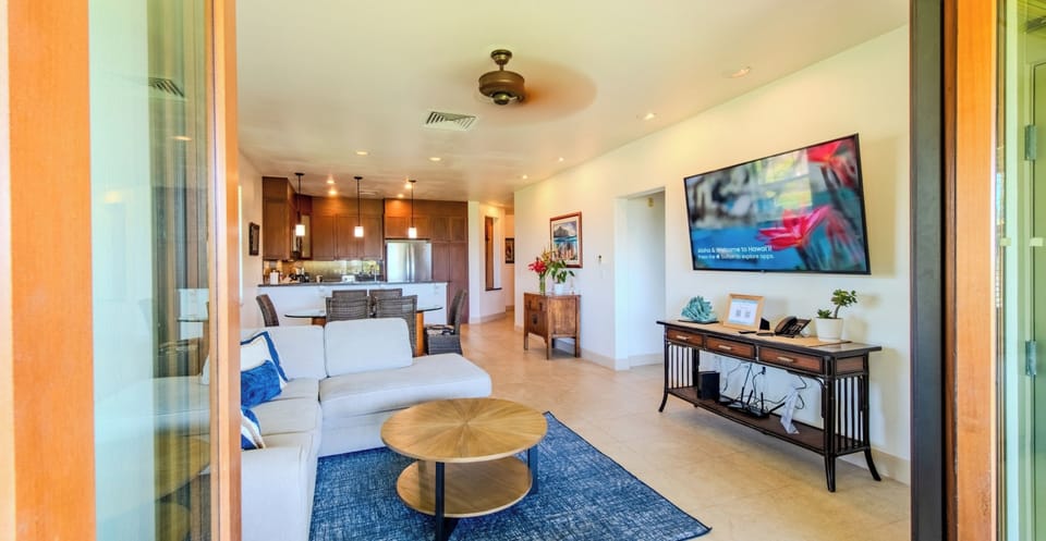 Gather comfortably in the open living area, light and airy.