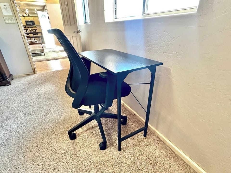Desk & chair in primary bedroom for the perfect remote work station!