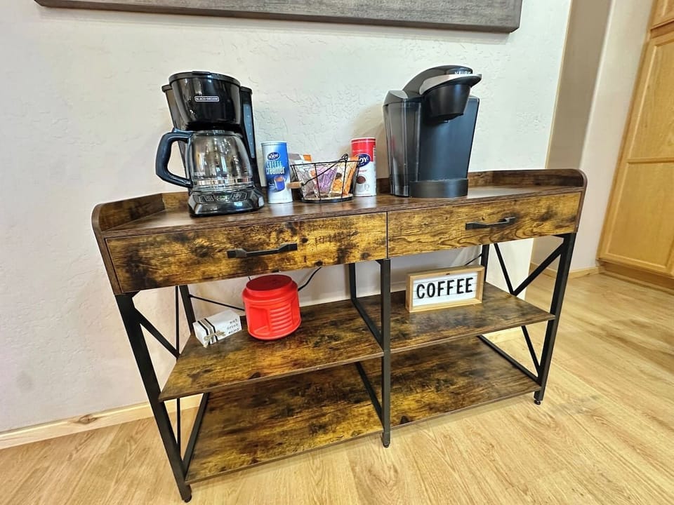 Full coffee bar with drip coffee machine and Keurig for k-pods. Grounds, pods, sugar, creamer & tea provided. 