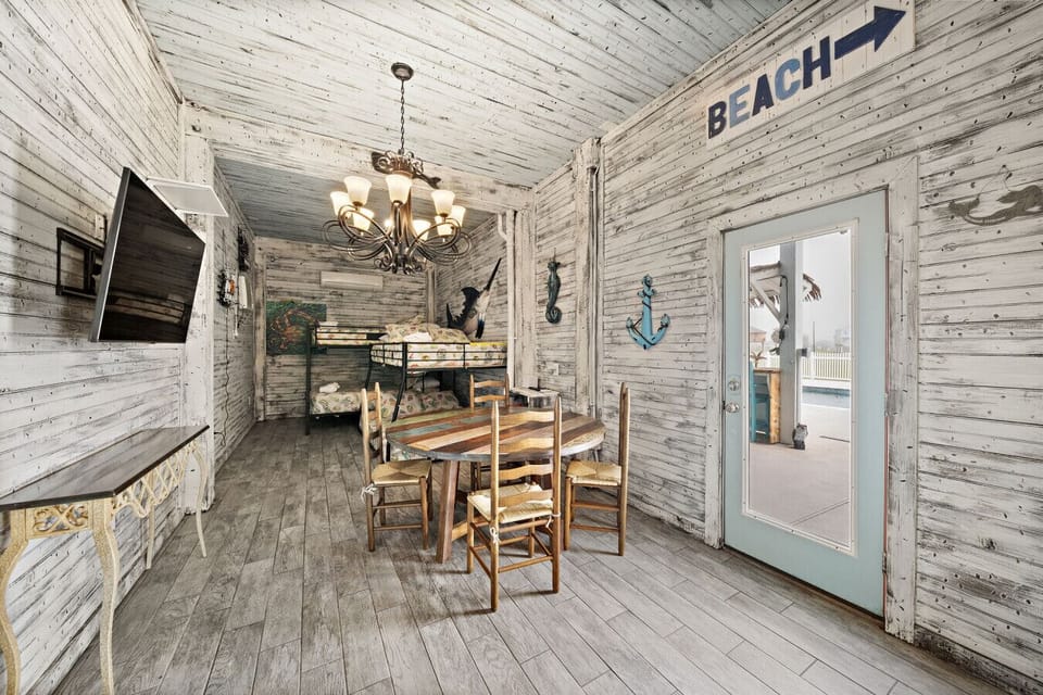 This bedroom has a full over full and queen over queen bunk beds