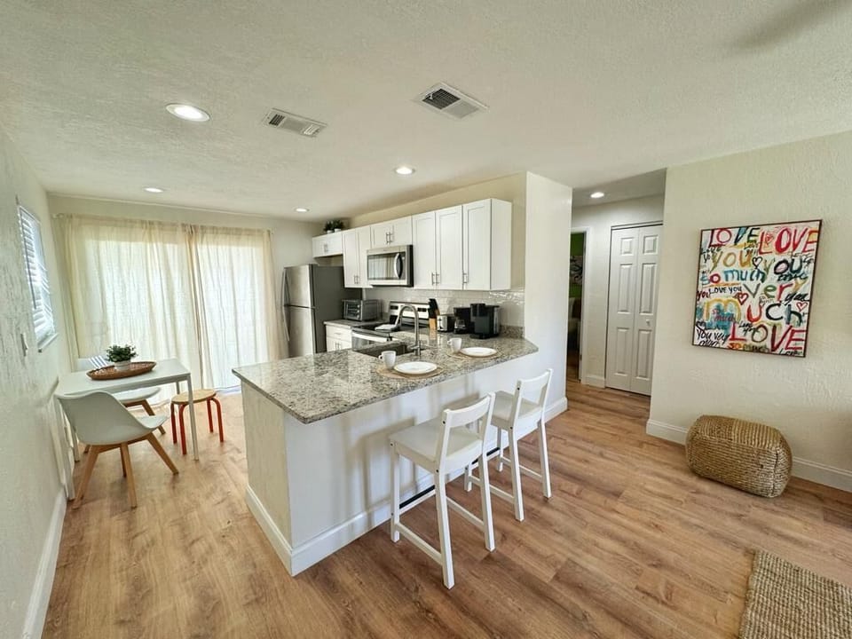 Prepare meals with ease in this fully stocked kitchen.
