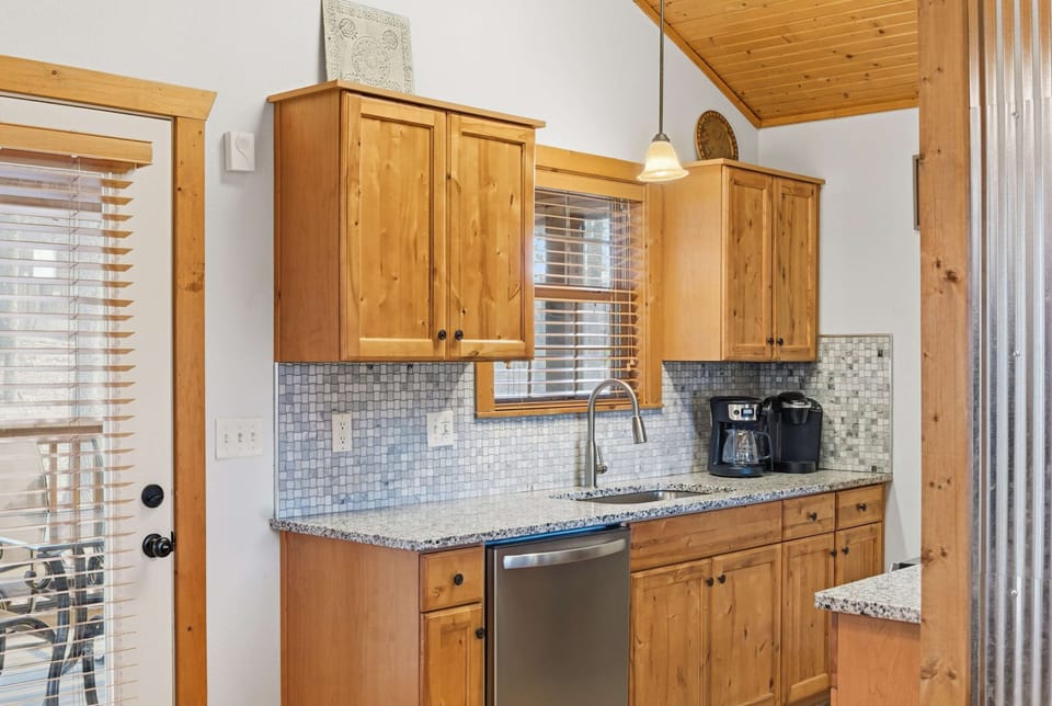 The inviting kitchen is well equipped for an unforgettable getaway​
