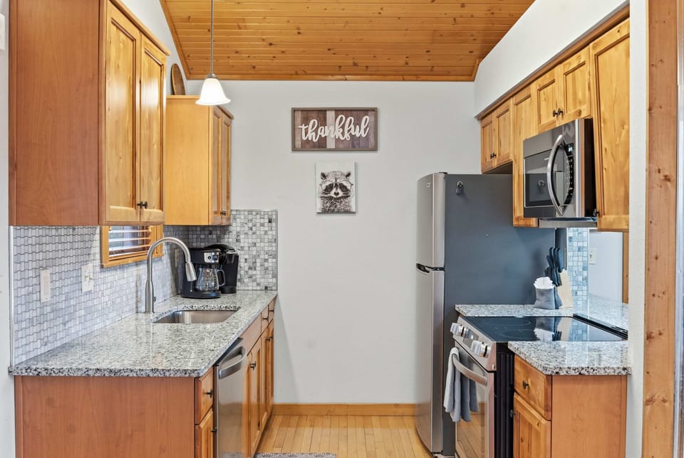 The inviting kitchen is well equipped for an unforgettable getaway​