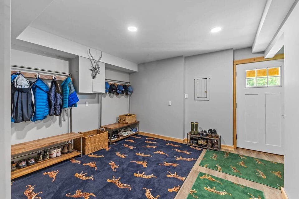 Entrance to home features huge mudroom