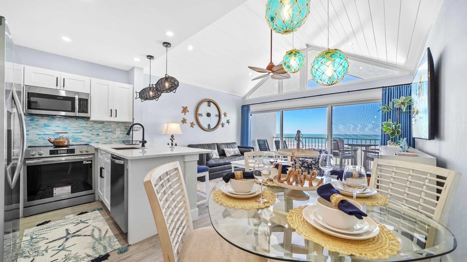 Open floor plan....view of dining, kitchen, living room, and the Gulf!