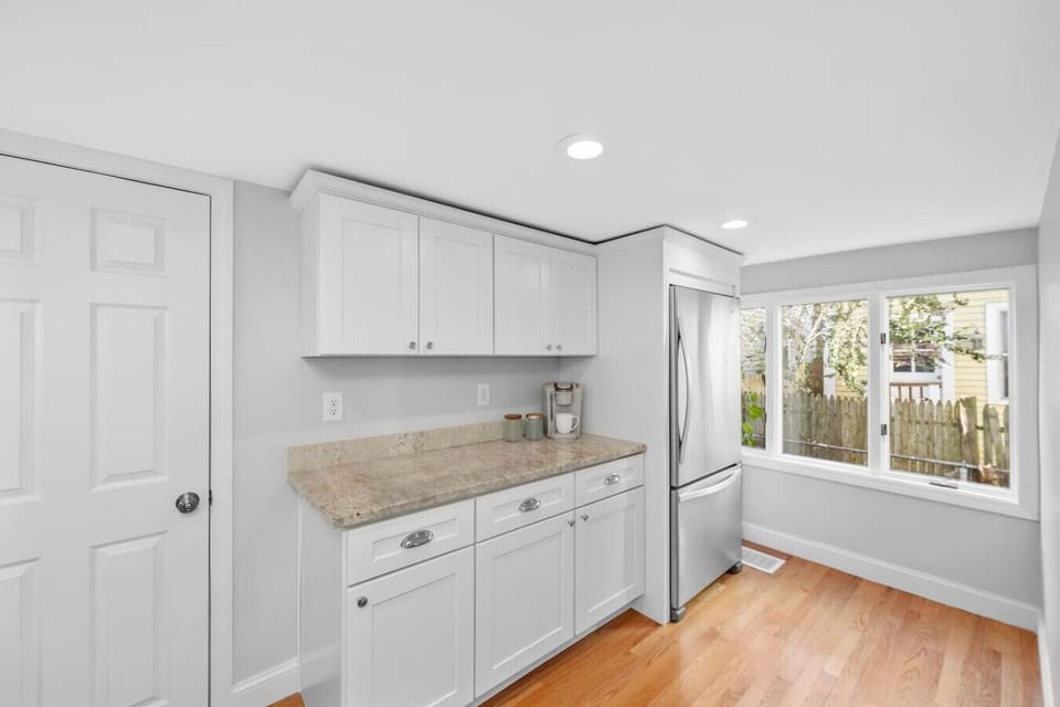 Brew your morning coffee or tea in this bright kitchen.