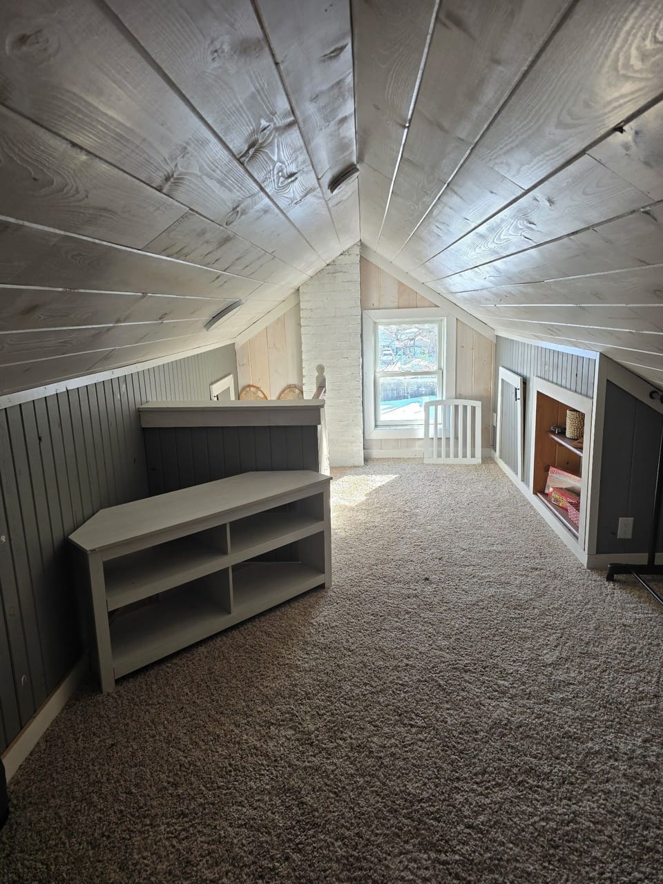 Loft area - steep stairs and lower ceilings, but so cozy! More space to relax. 