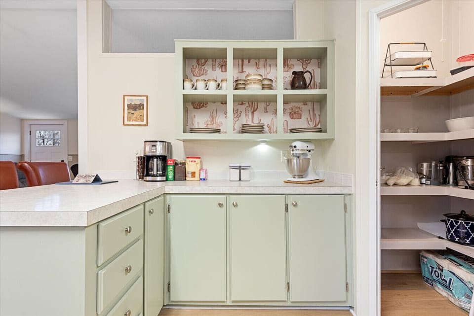 This kitchen is fully stocked with everything you need to cook at home if you choose.