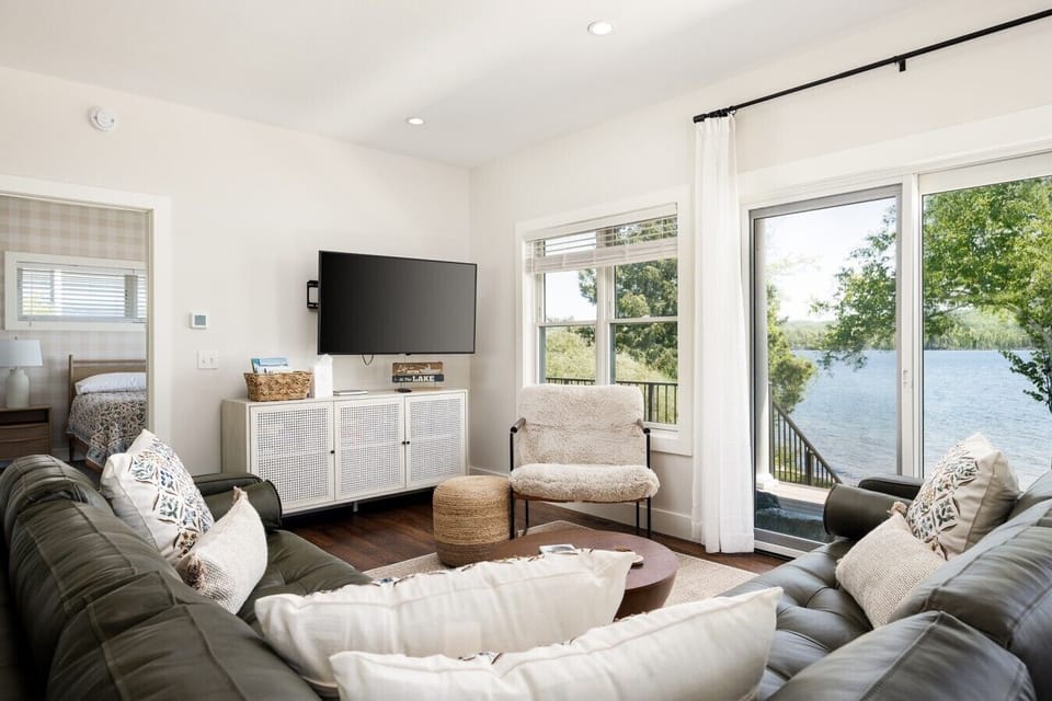 Living room facing tv and patio wide shot