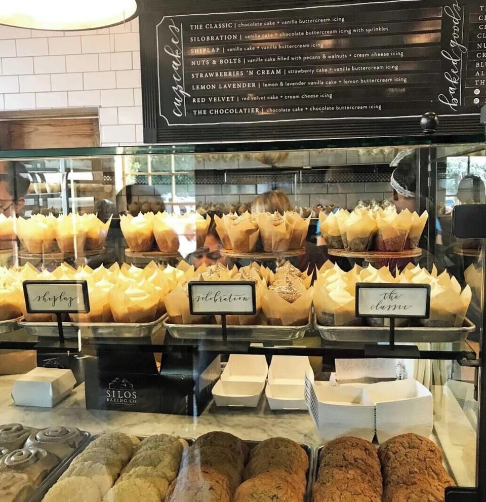 Charming local bakery with gourmet cupcakes, cookies, and stylish café vibes