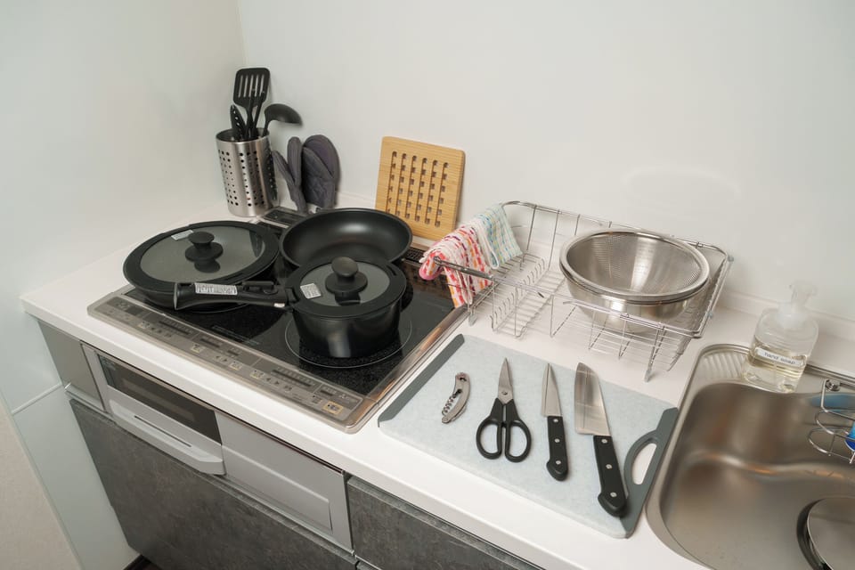 Comfort Condo, Balcony | Private kitchen | Full-size fridge, microwave, stovetop, rice cooker