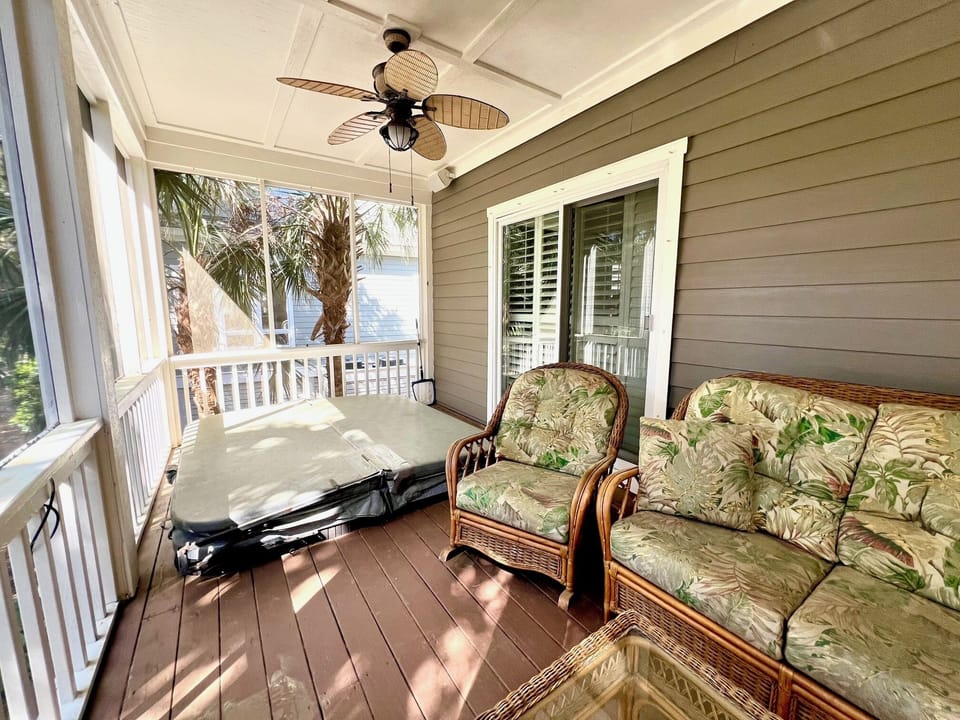 Unwind in the private hot tub on the screened porch. Pure bliss!