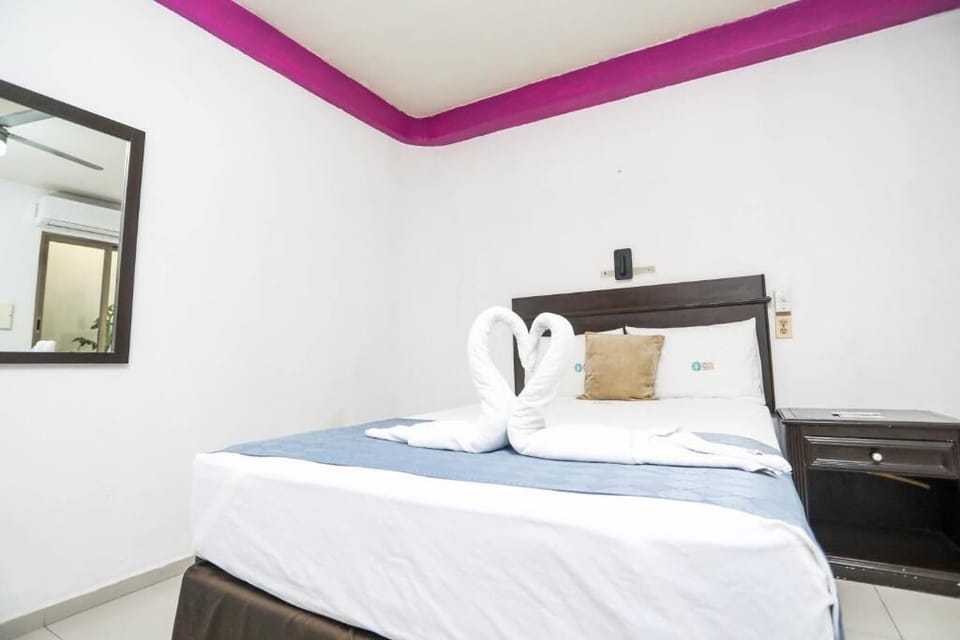 Drift off fast with plush pillows and sweet towel art.
