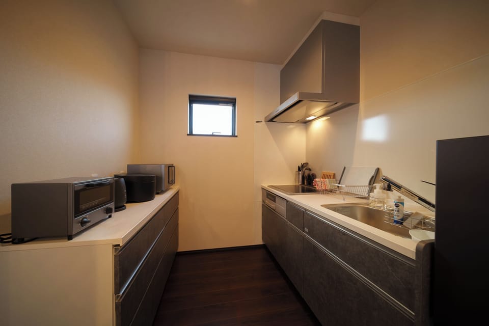 Comfort Condo, Non Smoking | Private kitchen | Full-size fridge, microwave, stovetop, toaster