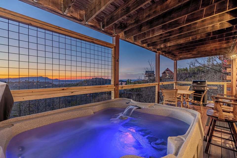 Hot tub sunset view from main level deck w chairs and gas grill...ahhhhh relaxed