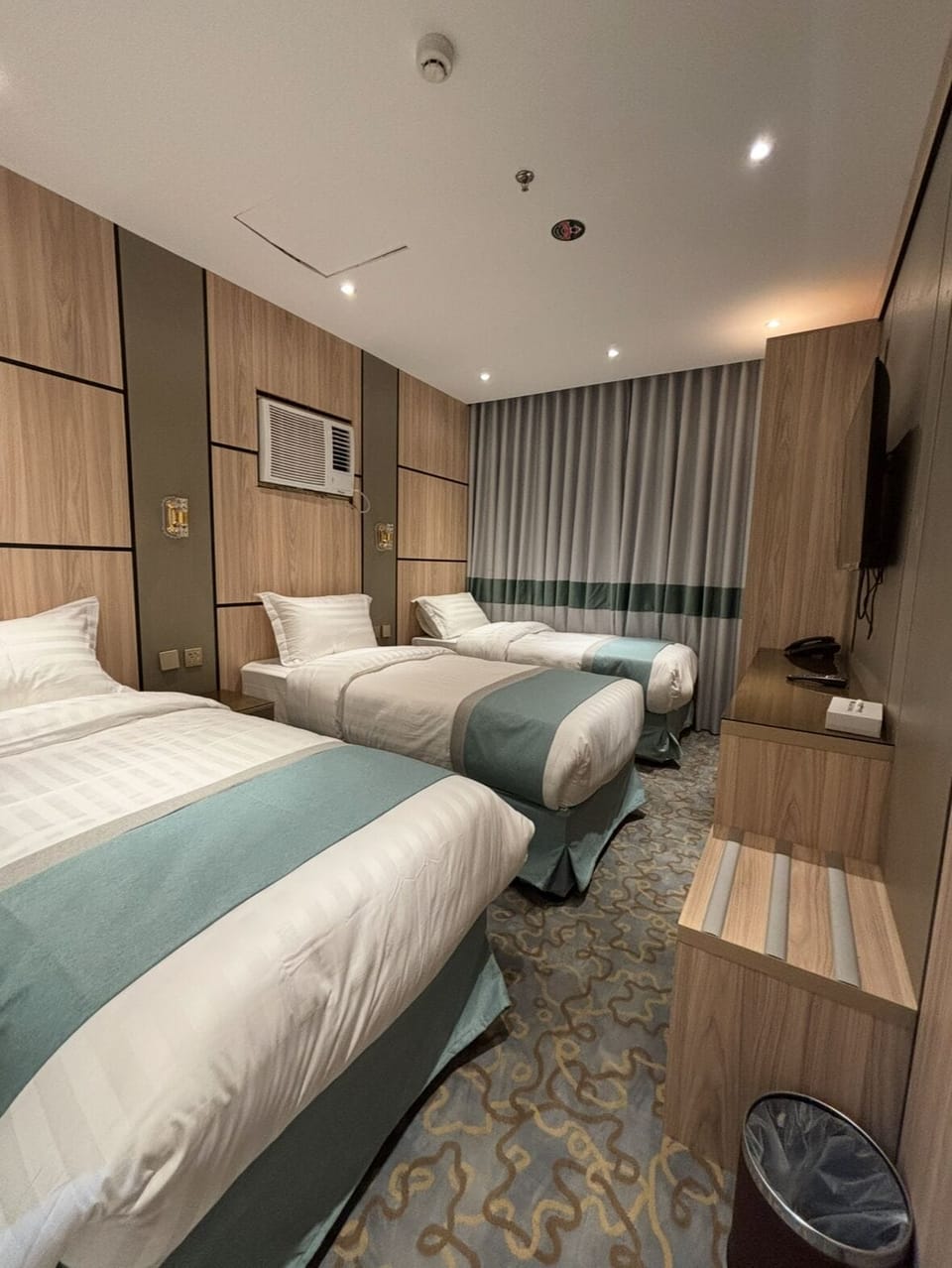 Triple Room | In-room safe, desk, laptop workspace, blackout drapes