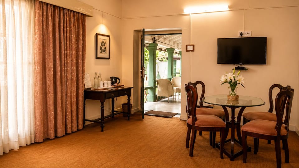 The Grand Suite | Living area | 10-inch TV with cable channels, first-run movies
