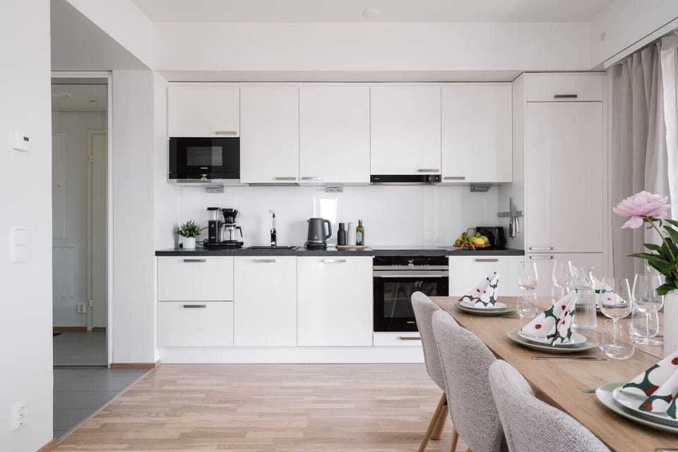 Bright and modern fully equipped kitchen ready for cooking and gathering.