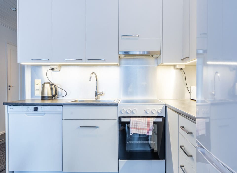 Modern appliances, including a dishwasher and coffee maker, to make your holiday effortless.