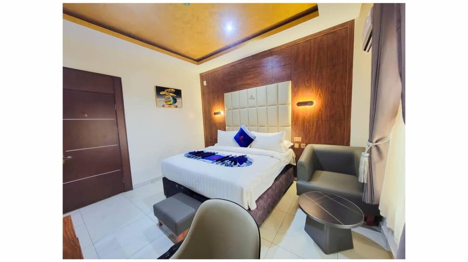 Premium Single Room, Pool View | In-room safe, desk, laptop workspace, blackout drapes