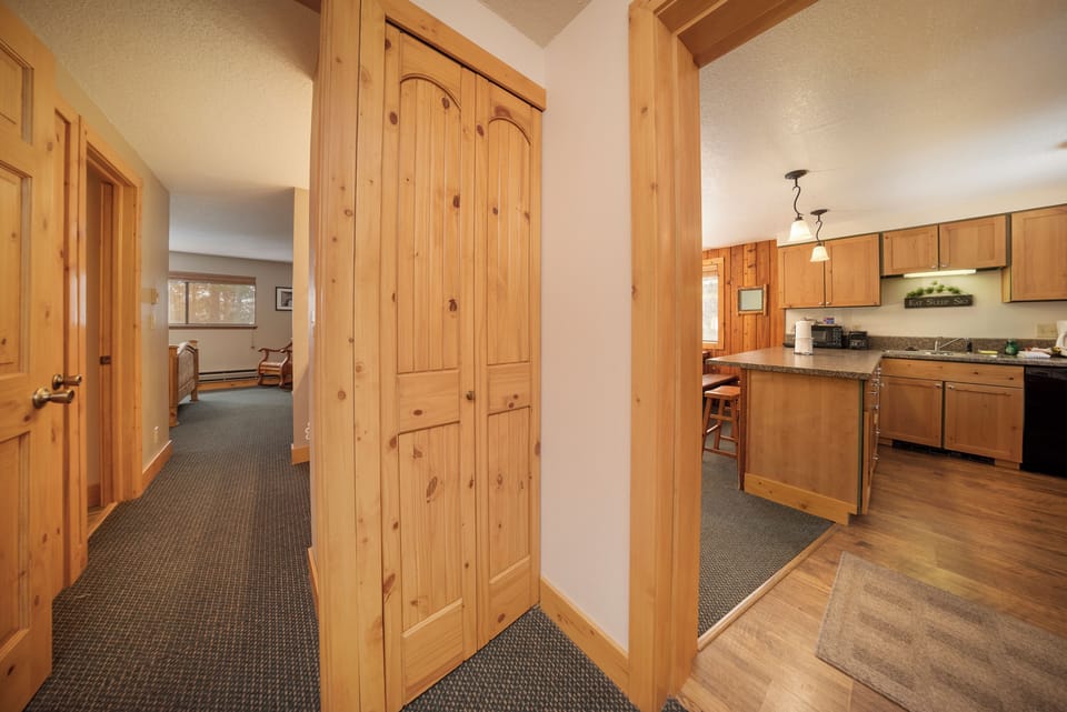 Step into your mountain retreat where warm wood finishes and open layouts create a cozy, welcoming atmosphere for your stay.