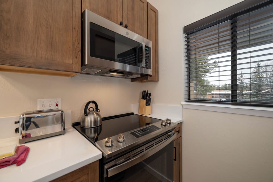 Your fully equipped kitchen features modern appliances and everything needed to prepare meals during your stay.