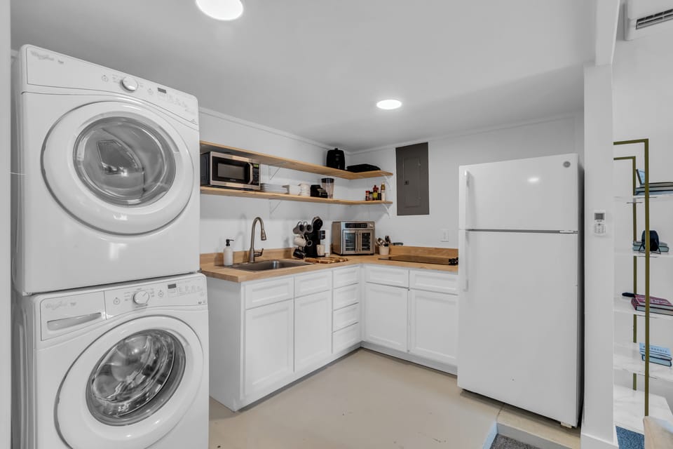 Enjoy a fully equipped kitchenette and convenient in-unit laundry amenities!