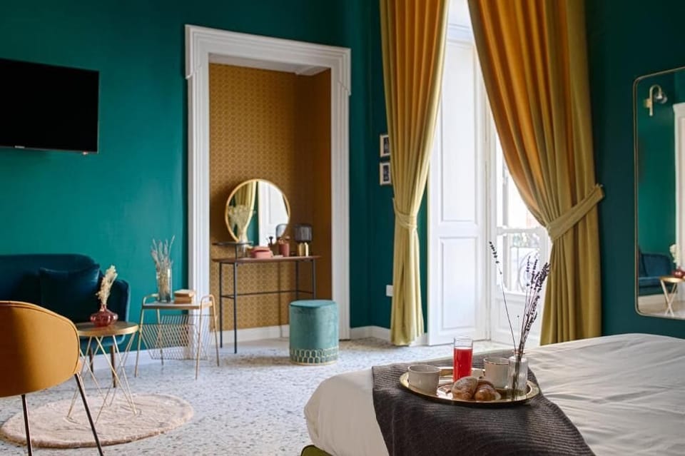 Junior Suite, Balcony, City View | In-room safe, blackout drapes, iron/ironing board, free WiFi