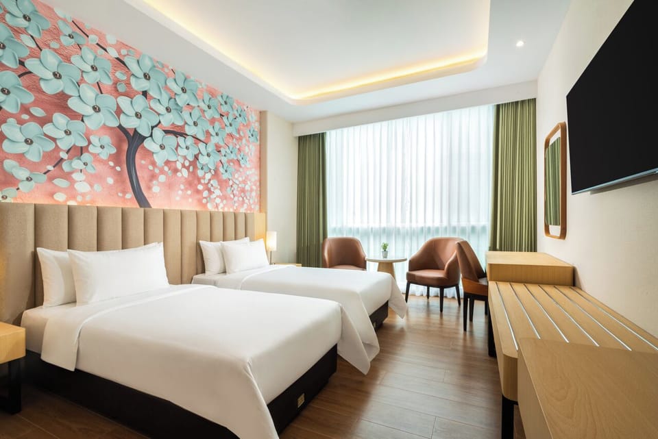 Minibar, laptop workspace, bed sheets