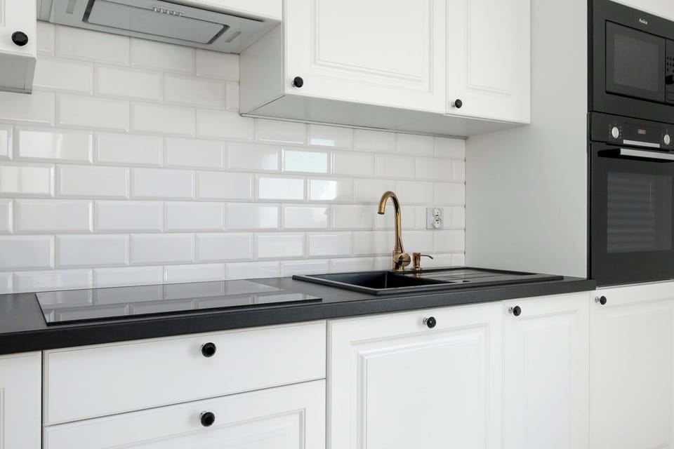 The kitchenette's practical layout maximizes space and functionality.