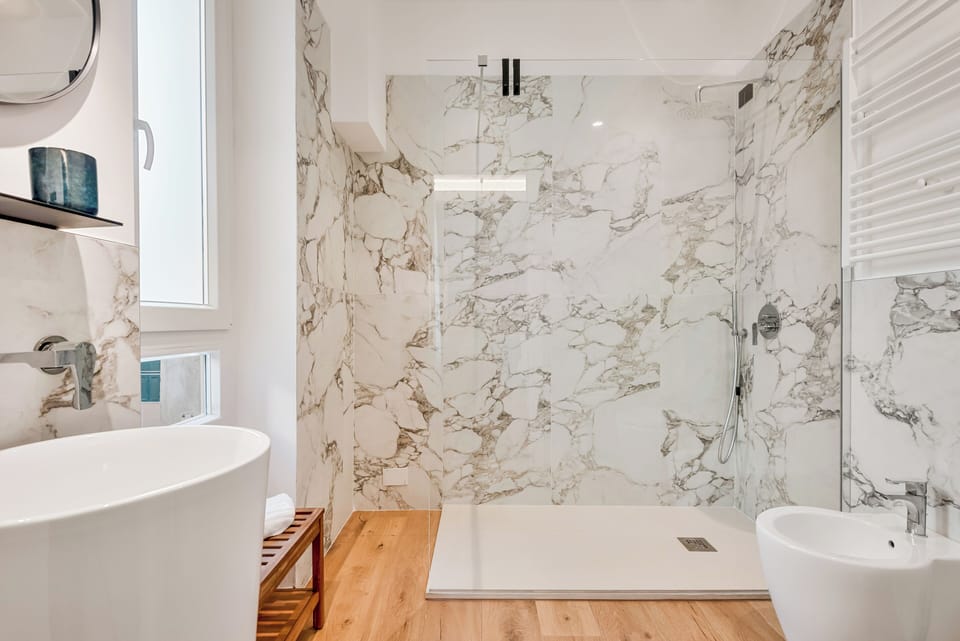 Comfort Room | Bathroom | Hair dryer, towels, soap, shampoo