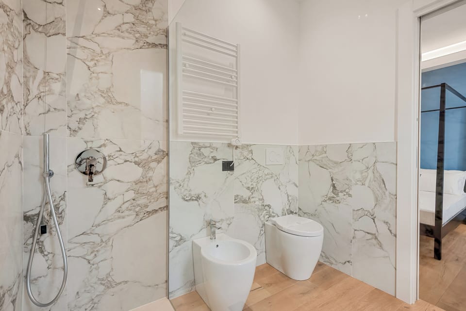 Comfort Room | Bathroom | Hair dryer, bidet, towels, soap