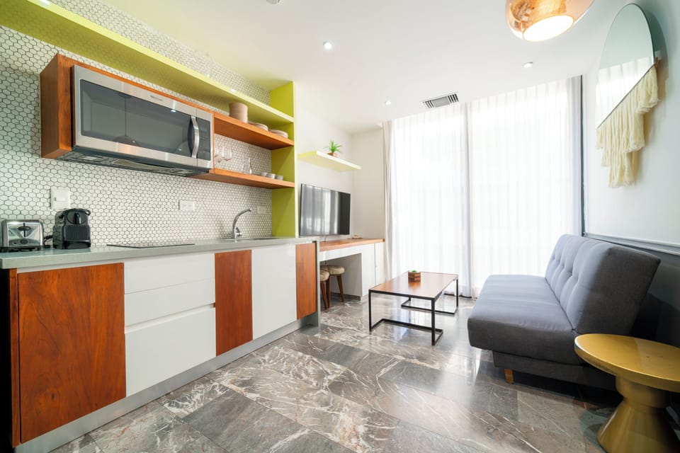 Deluxe Apartment, Balcony | Living area