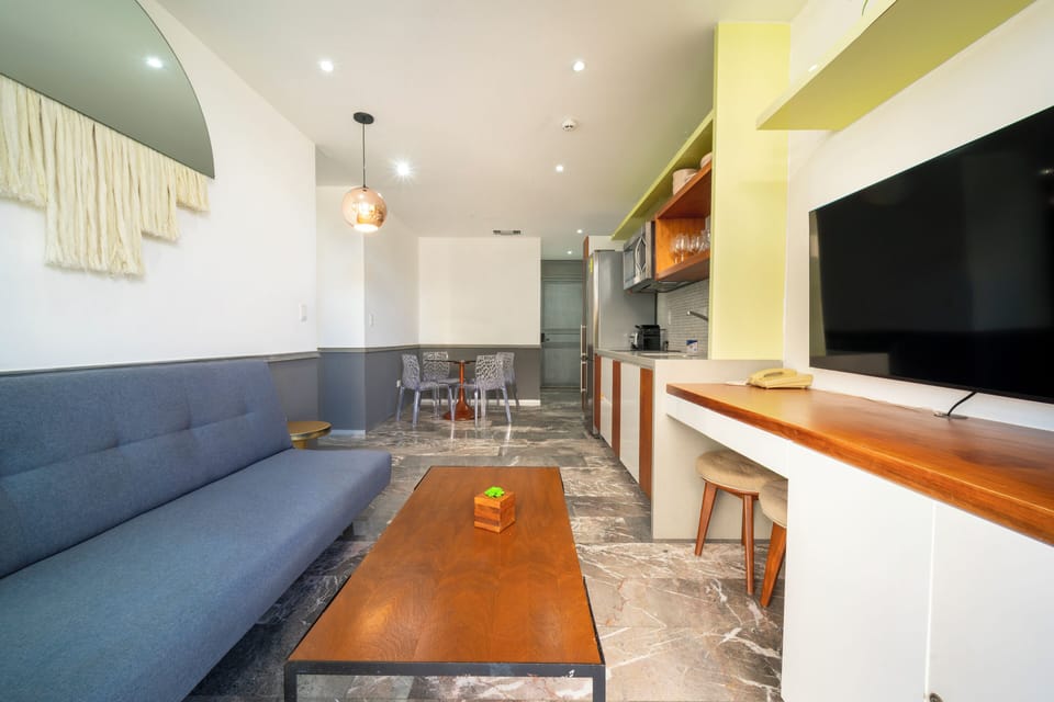 Deluxe Apartment, Balcony | Living area