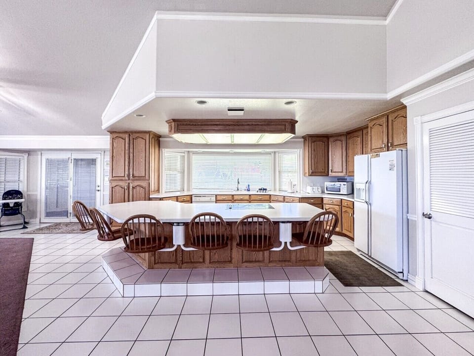 Spacious kitchen with panoramic views and ample seating—perfect for cooking, dining, and making memories