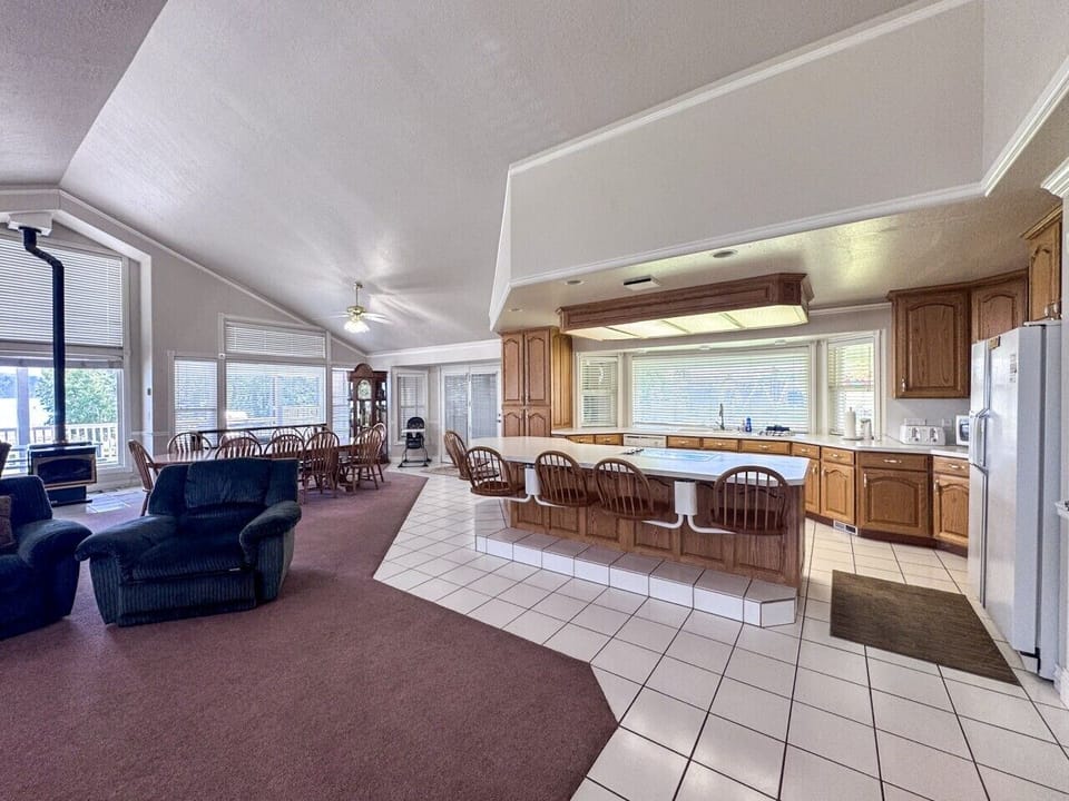 Spacious kitchen with panoramic views and ample seating—perfect for cooking, dining, and making memories